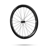 Quarter-turned side view of Black Inc FORTY SIX gravel rear wheel that appears to be floating against a transparent background.