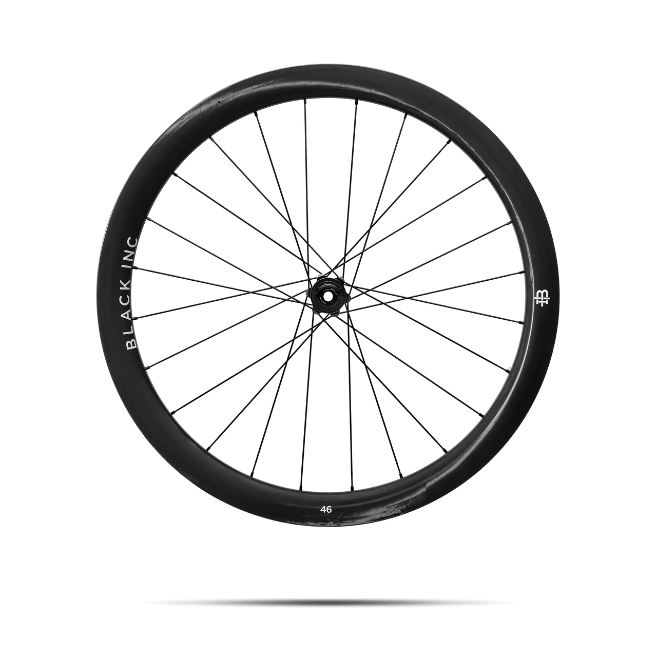Full view of Black Inc FORTY SIX gravel rear wheel that appears to be floating against a transparent background.